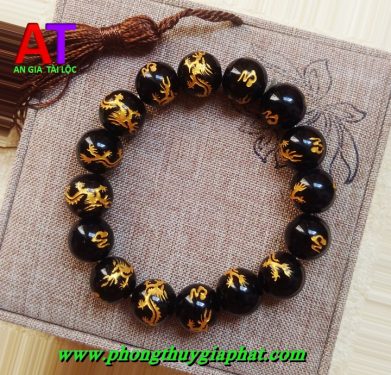 Vòng đeo tay đá đen huyền thạch chạm rồng