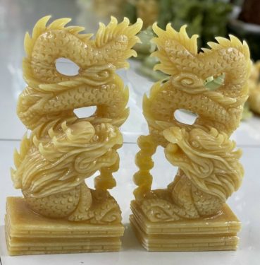 cặp tượng rồng đá ngọc hoàng long tự nhiên nguyên khối vàng đẹp